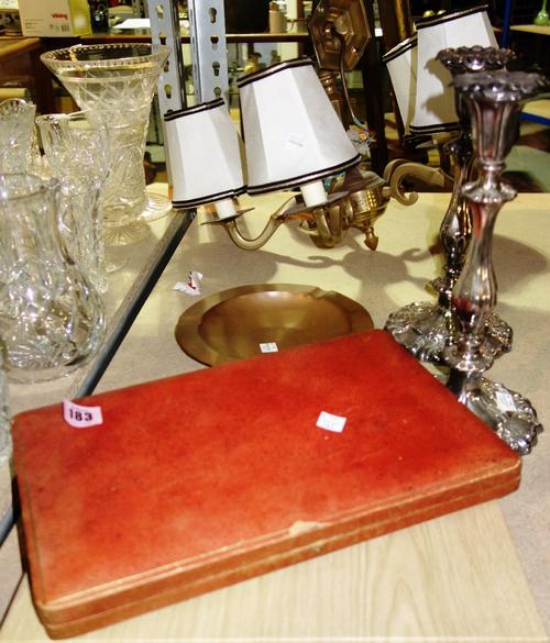 A pair of silver plated candlesticks and a cased set of butter knives, an ashtray and a chandelier.