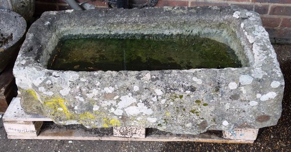 A rectangular carved stone trough, circa 18th century, 105cm wide x 50cm high.