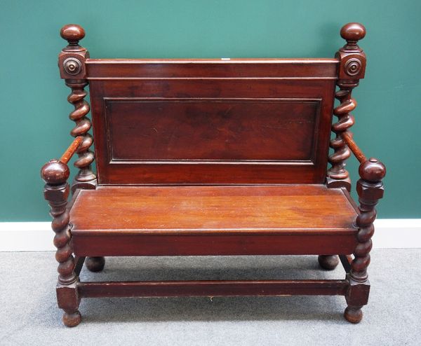 A made-up Victorian mahogany hall bench, with barleytwist supports and solid seat, 112cm wide.