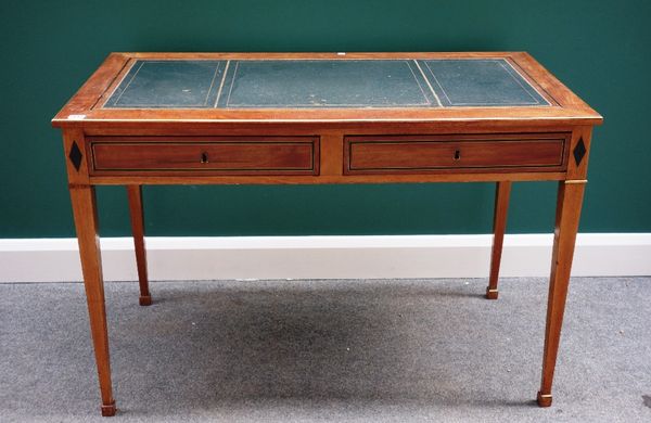 A Louis XVI style gilt metal mounted walnut bureau plat, with pair of frieze drawers and dummy opposing, on tapering square supports, 114cm wide.