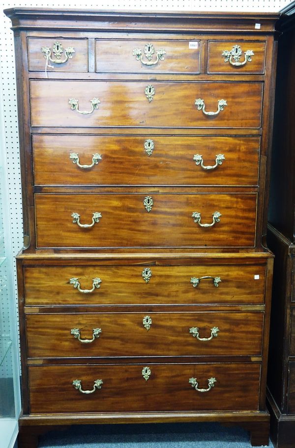 A George III mahogany chest on chest of three short over six long graduated drawers, on bracket feet, 106cm wide x 180cm high.