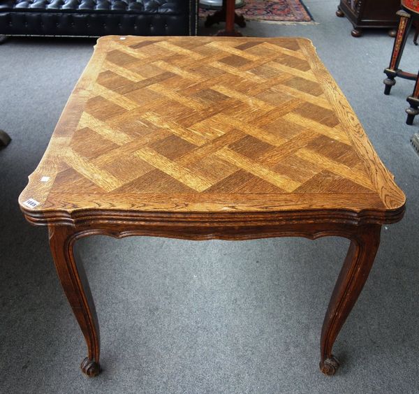 A late 19th century/early 20th century ash and oak parquetry inlaid draw leaf dining table, on scroll supports, 90cm wide x 120cm long x 200cm long ex