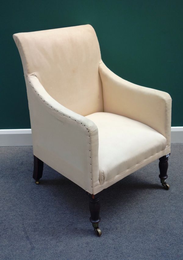 A William IV mahogany framed square back library chair, on turned supports.