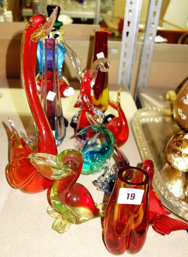 A quantity of 20th century decorative coloured glass, including a Murano style clown, animals, vases and sundry, (qty).