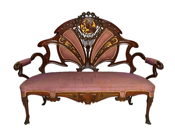 An Italian Art Nouveau three piece salon suite, possibly made by The Cadorin Family, to comprise; a sofa 160cm wide and a pair of armchairs, each with