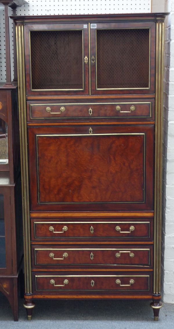 A Directoire brass inlaid mahogany secretaire a abattant, the pair of grille doors over single long drawer and fall front revealing a fitted interior