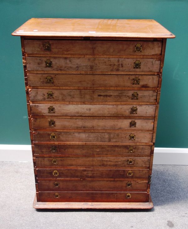 A Victorian mahogany collector's chest, with twelve long drawers on compressed bun feet, 81cm wide.