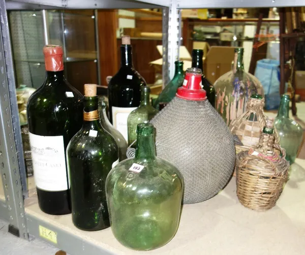 A group of 20th century magnum wine bottles and a quantity of assorted distillers jars.