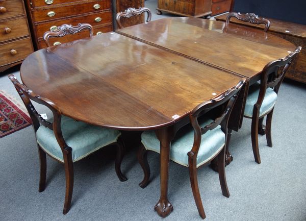 A mid 18th century and later walnut double drop flap dining table, on claw and ball feet, 126cm wide x 122cm long x 262cm long extended.