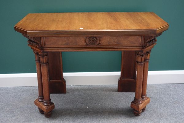 A pair of adapted late 19th century walnut console tables with canted rectangular tops, on turned front supports, 110cm wide. (2)