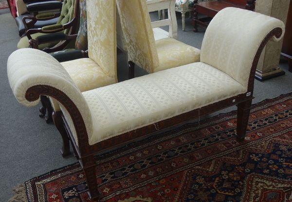 A mid 18th century style window seat with roll over arms, on carved scumble painted tapering square supports, 155cm wide.