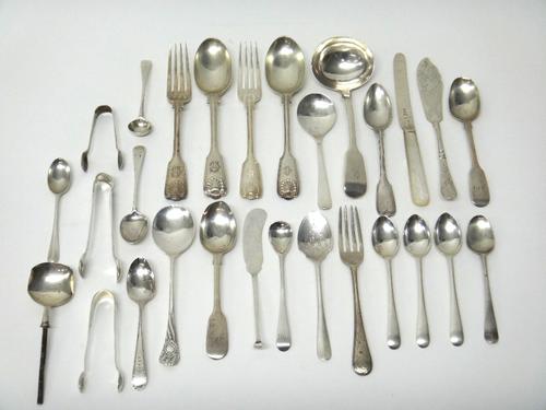 Silver table flatware, comprising; a Victorian fiddle pattern sauce ladle, London 1845, three pairs of sugar tongs and twenty-three further items of s
