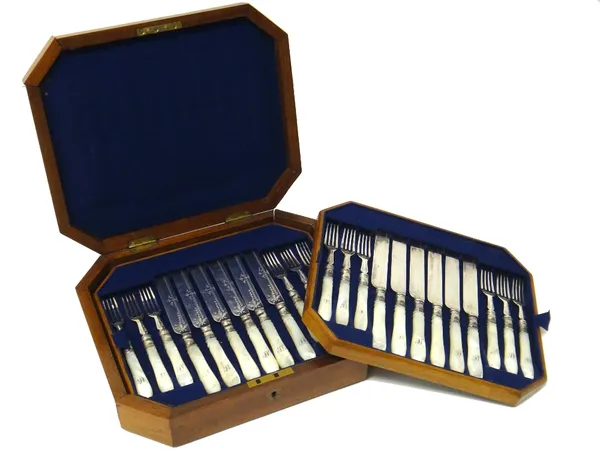 A set of eighteen Victorian pairs of plated dessert knives and forks, having mother of pearl handles, monogram engraved SS, with a fitted wooden case,