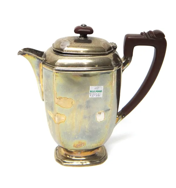 A George VI silver hot water jug of plain canted form, Birmingham 1939, with composite fittings, gross weight 554gms.