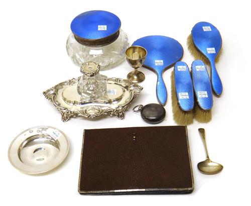 Silver and silver mounted wares, comprising; a Victorian shaped oval inkstand, decorated with a scrolling border, raised on four feet, with a silver m