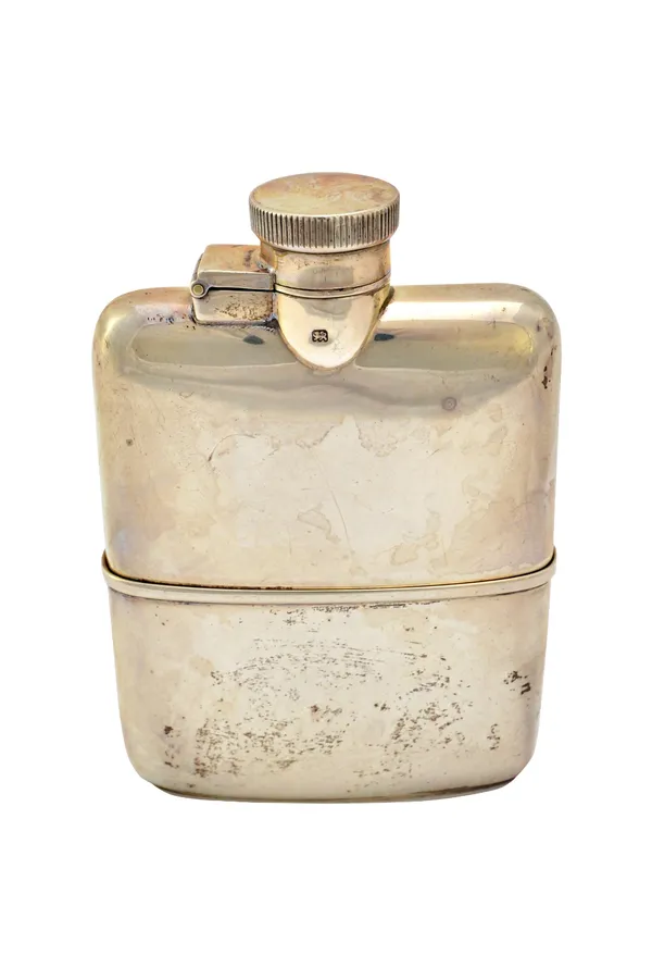 A silver spirit flask, of plain rectangular form, having a pull-off beaker base, maker Goldsmiths & Silversmiths Co Ltd, London 1930, weight 150 gms.
