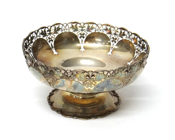 A George VI silver fruit bowl by Mappin & Webb, Sheffield 1938, with pierced foliate border, raised on a shaped circular pedestal foot, gross weight 5