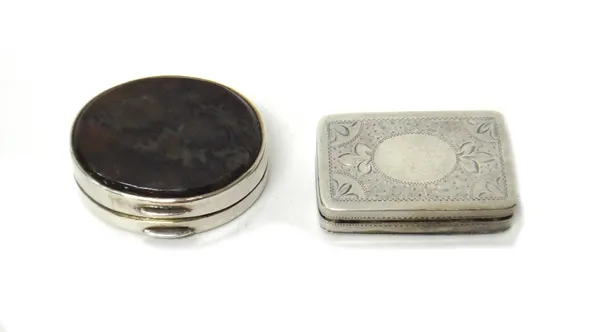 A silver and agate set oval vinaigrette, with a floral and scroll pierced grille, the exterior with engraved decoration to the underside and with an a