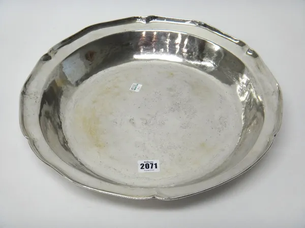 A South American shaped circular basin, with a slightly inverted rim, probably Peruvian, mid 18th century, diameter 39cm, weight 1290 gms