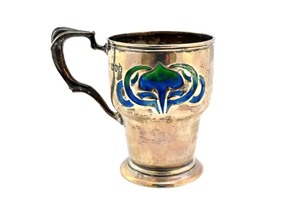 A silver and enamelled Art Nouveau mug, having a shaped handle, the body with blue/green enamelled Art Nouveau decoration, height 9cm, London 1902, gr