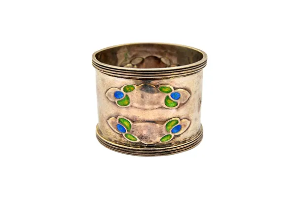 A silver and enamelled Art Nouveau napkin ring, decorated with blue/green enamelled cloud shaped motifs between ridged edges, Birmingham 1902, gross w