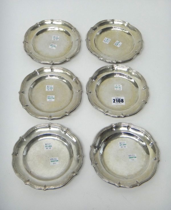 Six South American shaped circular dishes, each decorated with a shaped reeded border, probably 19th century, Peruvian, average diameter 15cm, combine