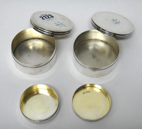 A silver circular box, with a detachable cover, Birmingham 1903, a silver circular box, with a detachable cover, Birmingham 1912 and a silver circular