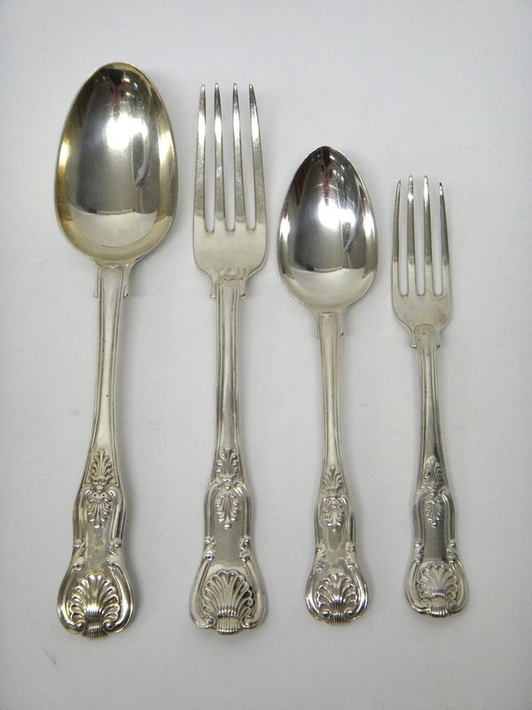 A William IV and later composite canteen of silver double struck Kings pattern flatware, comprising; eight tablespoons, fourteen dessert spoons, thirt