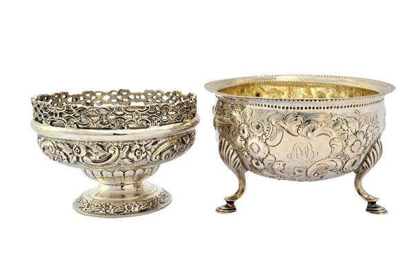 Silver, comprising; an Irish bowl, of circular form, having later floral and scroll embossed decoration, raised on three feet, Dublin circa 1800, diam