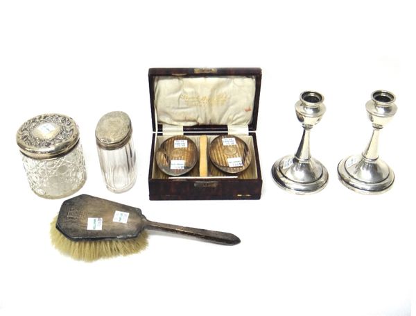 A pair of silver mounted oval hairbrushes and a matching comb, Birmingham 1926, with a case and further silver mounted wares, comprising; a pair of ca