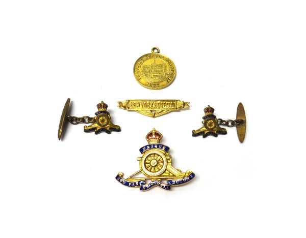 A gold circular medal, detailed Training School for Nurses 1877, presented to Amy Bland Hill, April 1895, a suspension brooch bar, detailed New York H