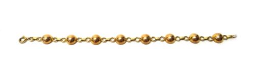 A gold bracelet, in a hemispherical circular and oval link 1940's design, on a boltring clasp, length 19.5cm, weight 13 gms.