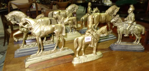 A quantity of 19th century and later brass door stops modelled as horses. (qty)