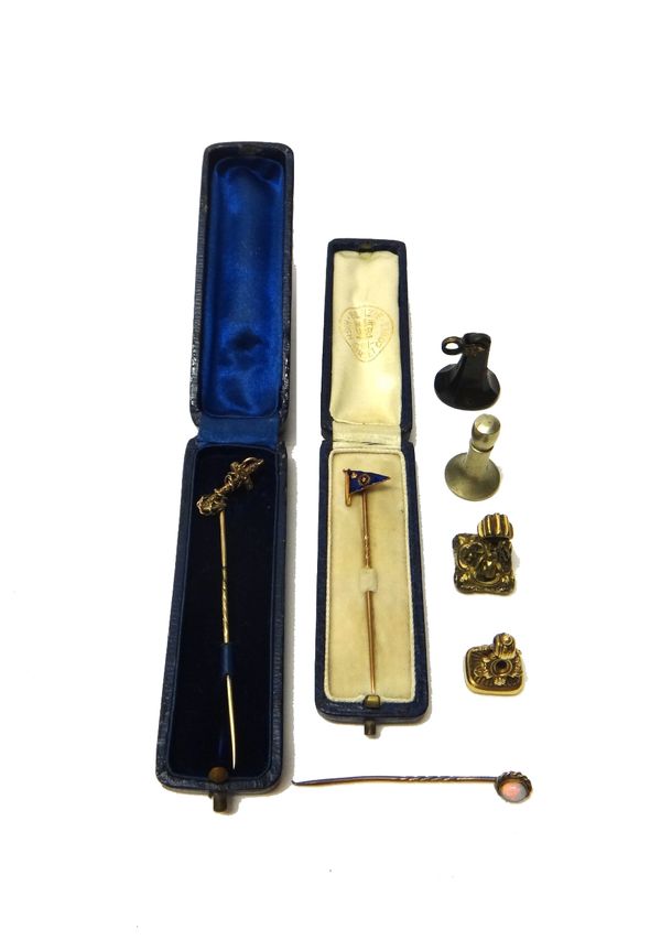 A gold and blue enamelled stick pin, designed as a yachting pennant, detailed 18 CT Benzie, Cowes, cased, a Victorian stick pin, with an anchor finial