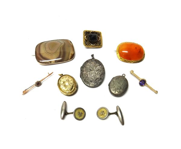 A gold and garnet set brooch, in a square design, with filigree decoration, a gold mounted oval cornelian set brooch, a gold mounted pale brown agate