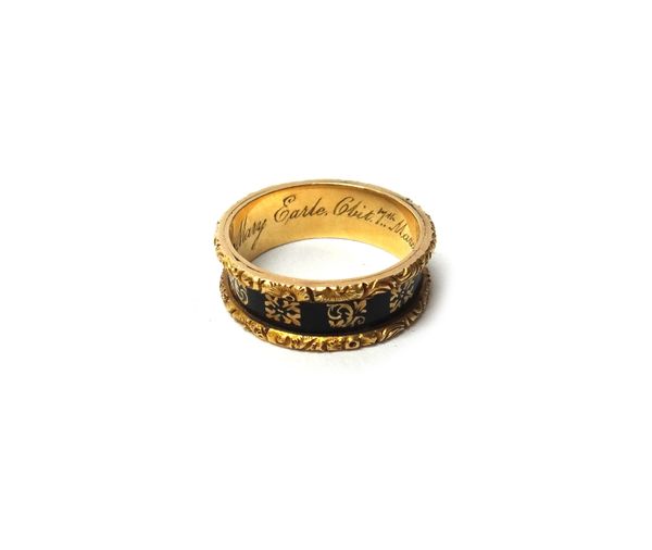 A Victorian 18ct gold and black enamelled mourning band ring, detailed 'Mary Earle Obit 7th March 1887 aet 54 years', Birmingham 1874, ring size P.