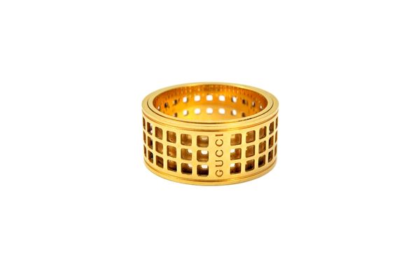 A Gucci Italian gold Pantheon wide rotating band ring, having square pierced decoration, detailed 22 GUCCI made In Italy 750, width 1.1cm, size T and