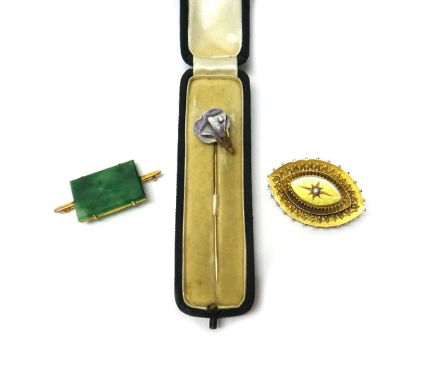 A diamond set and mauve enamelled stick pin with a flowerhead motif, with a Tiffany & Co, London case, a gold bar brooch, mounted with a rectangular j