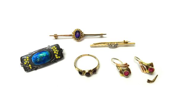 A gold and platinum, diamond set bar brooch, having a Navy crown motif, a gold, amethyst and seed pearl set oval cluster bar brooch, a Merle Bennett &