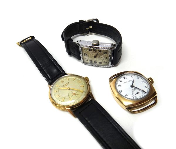 A gentleman's 9ct gold, circular cased Longines wristwatch, the signed circular silvered dial, with gilt arrow shaped and Arabic numerals and with sub