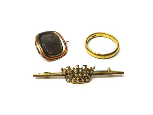 An 18ct gold plain wedding ring, ring size V, weight 6.5 gms, a gold and seed pearl set bar brooch, with a Navy crown motif, detailed 14 CT and a curv