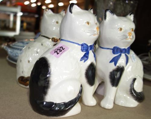 A group of four pottery figures of seated cats , a William Morris design plate and sundry.