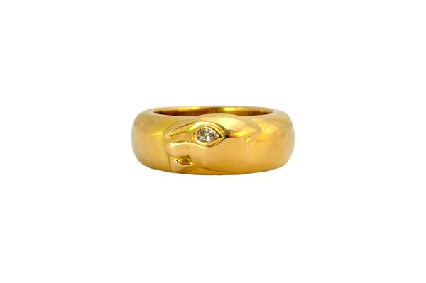 An 18ct gold Cartier Panthere ring designed as the head of a panther in side profile, with a diamond set eye, marked 'Cartier 1996 750 52 EO917', ring