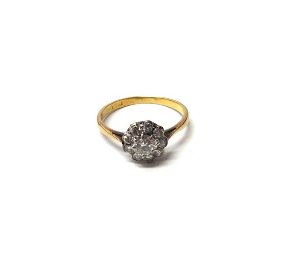 A white gold and diamond set single stone ring, mounted with a cushion shaped diamond, within a square shaped setting, the diamond weighs approx 0.50