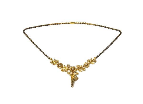 A gold and seed pearl set necklace, the front in a floral and foliate design, (the central pendant lacking, but fitted with two seed pearl set bails),