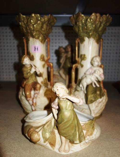 A pair of Royal Dux vases, a centrepiece and a bowl. (4)