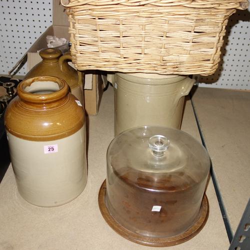 A group of four large early 20th century stoneware pots, two with lids, together with two glass cheese domes and a cane hamper. (7)