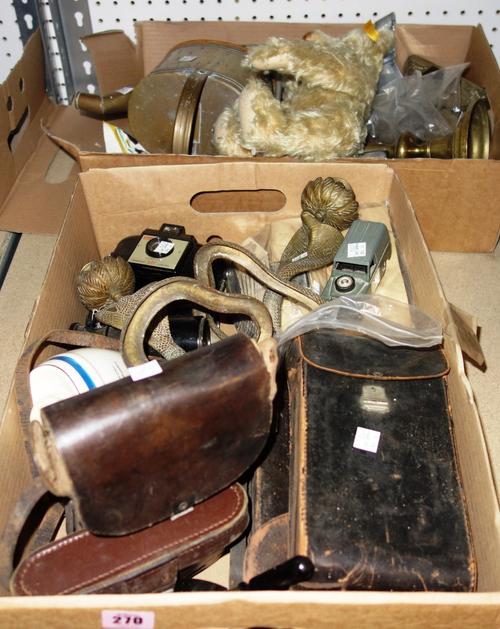 A quantity of metalware and collectables including cameras, binoculars, candlesticks and sundry.
