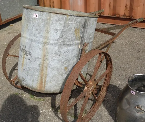 A wrought iron water bowser.