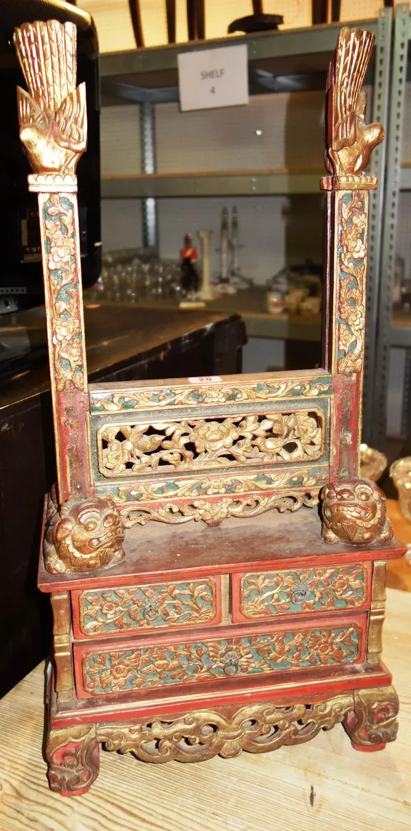 A 19th century Chinese red and gilt painted stand.